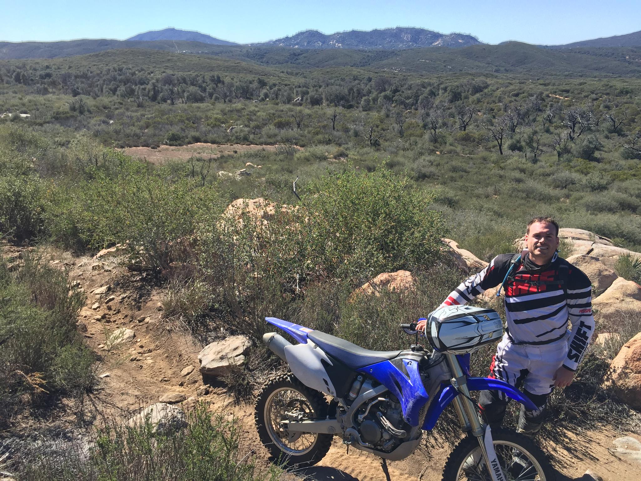 Posing with Yamaha WR on a desert trail
